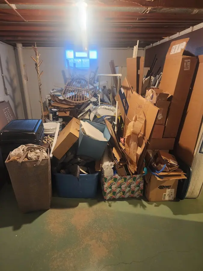 Roll-off dumpster container at job site for 6 Yard Dumpster Rental in Keene